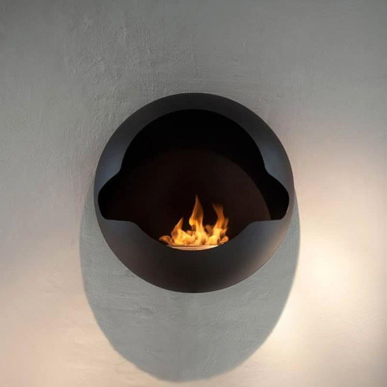 Vauni Cupola fixée au mur et sa flamme jaillissant de son coeur