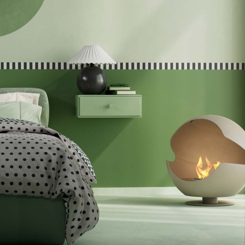 Cheminée bioéthanol Vauni Globe Almond (Pied bas) posée dans une chambre