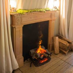 Insert de cheminée électrique Dimplex Silverton posée devant une cheminée sous une tente