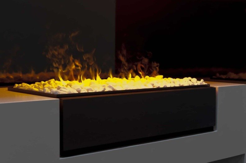 Insert électrique à poser Cassette L Galets de Dimplex avec sa flamme orangée au centre