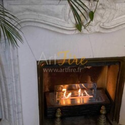 Cheminée de table bio éthanol Woody installée dans une cheminée chez un client