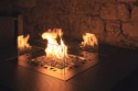 Vue sur la flamme de la cheminée gaz Square Table de Planika