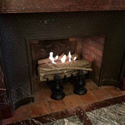 Belle installation du Fer Noir Changy dans le foyer d'une cheminée
